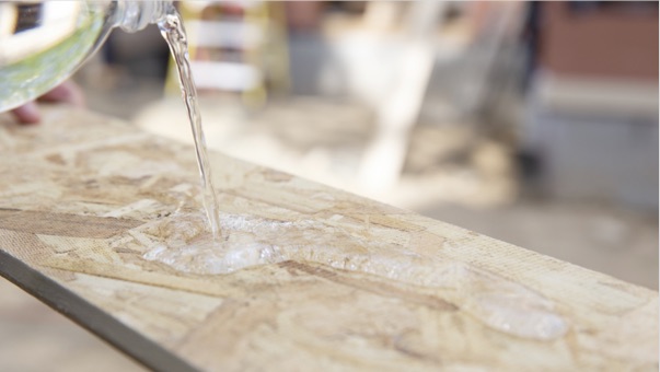 water pouring on wood